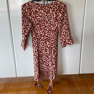 Nude and burgundy cheetah dress with cheetah belt.
